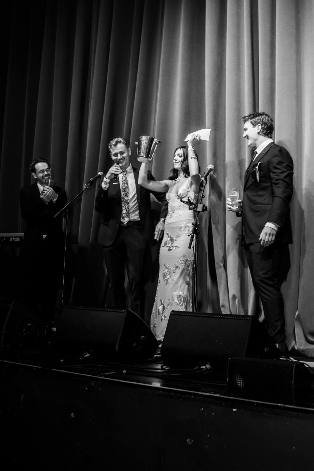 Singers on stage at the Mates Ball